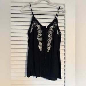 Elegant Black Camisole with White Floral Detailing